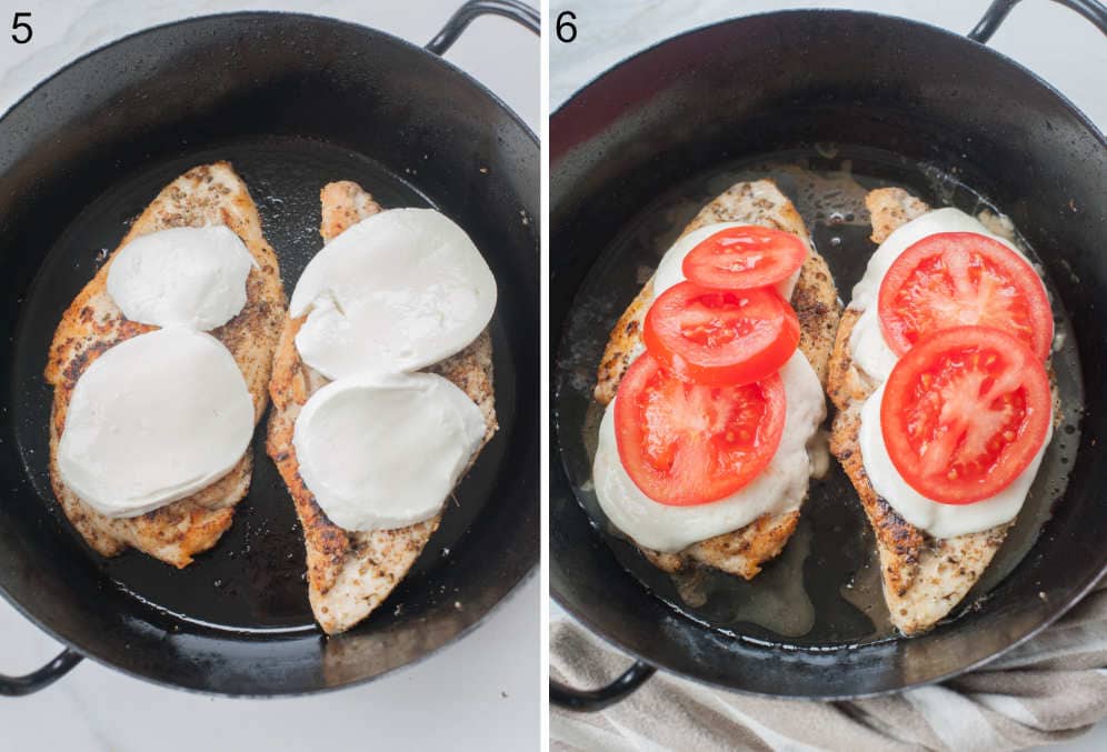 Seared chicken in a black pan topped with mozzarella cheese and tomato slices.