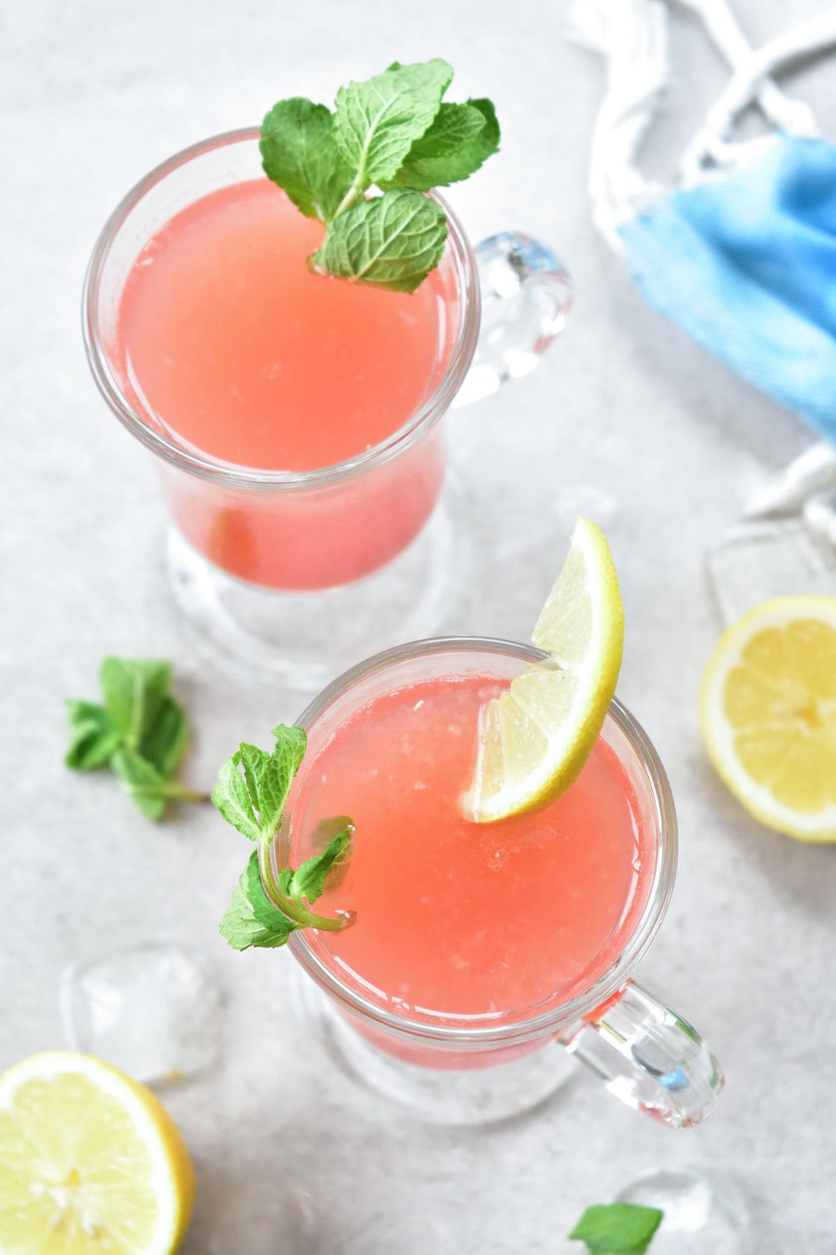 Two glasses with watermelon mint lemonade.