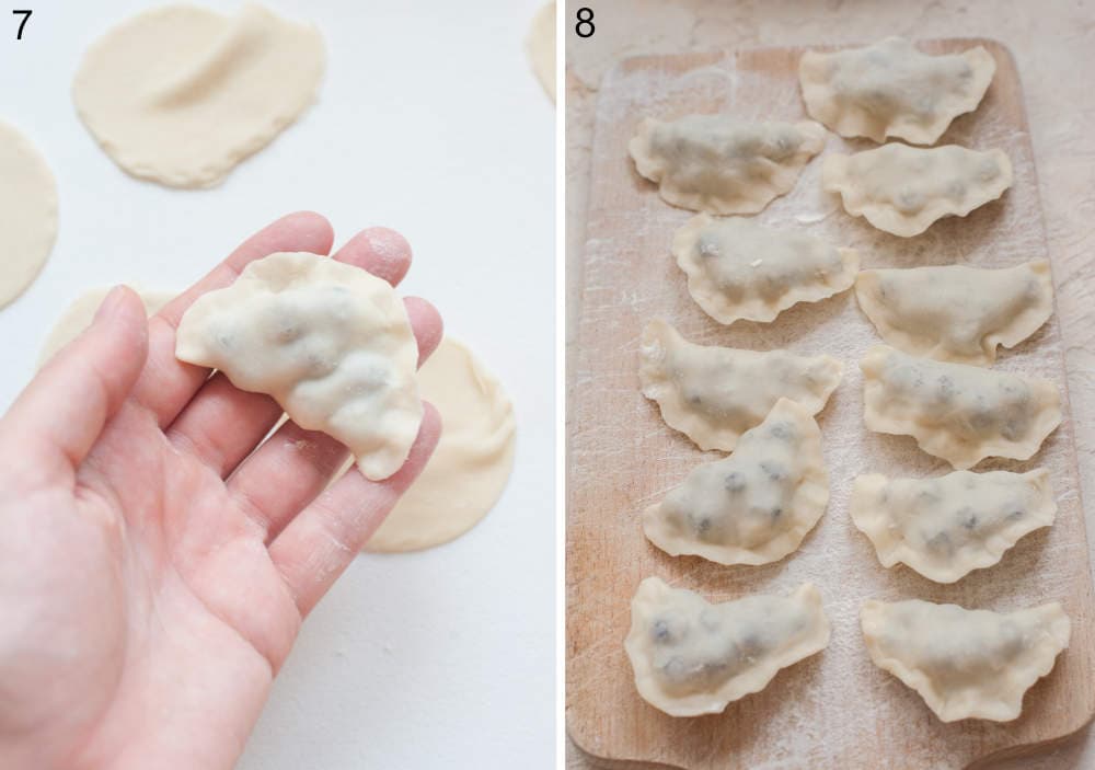 Uncooked pierog held in a hand. Uncooked pierogi on a chopping board.