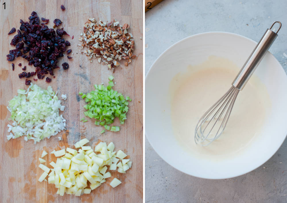 Chopped ingredients for chicken salad on a wooden board. Salad dressing in a white bowl.