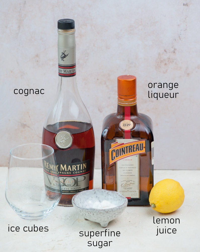 Labeled ingredients needed to prepare a sidecar cocktail.