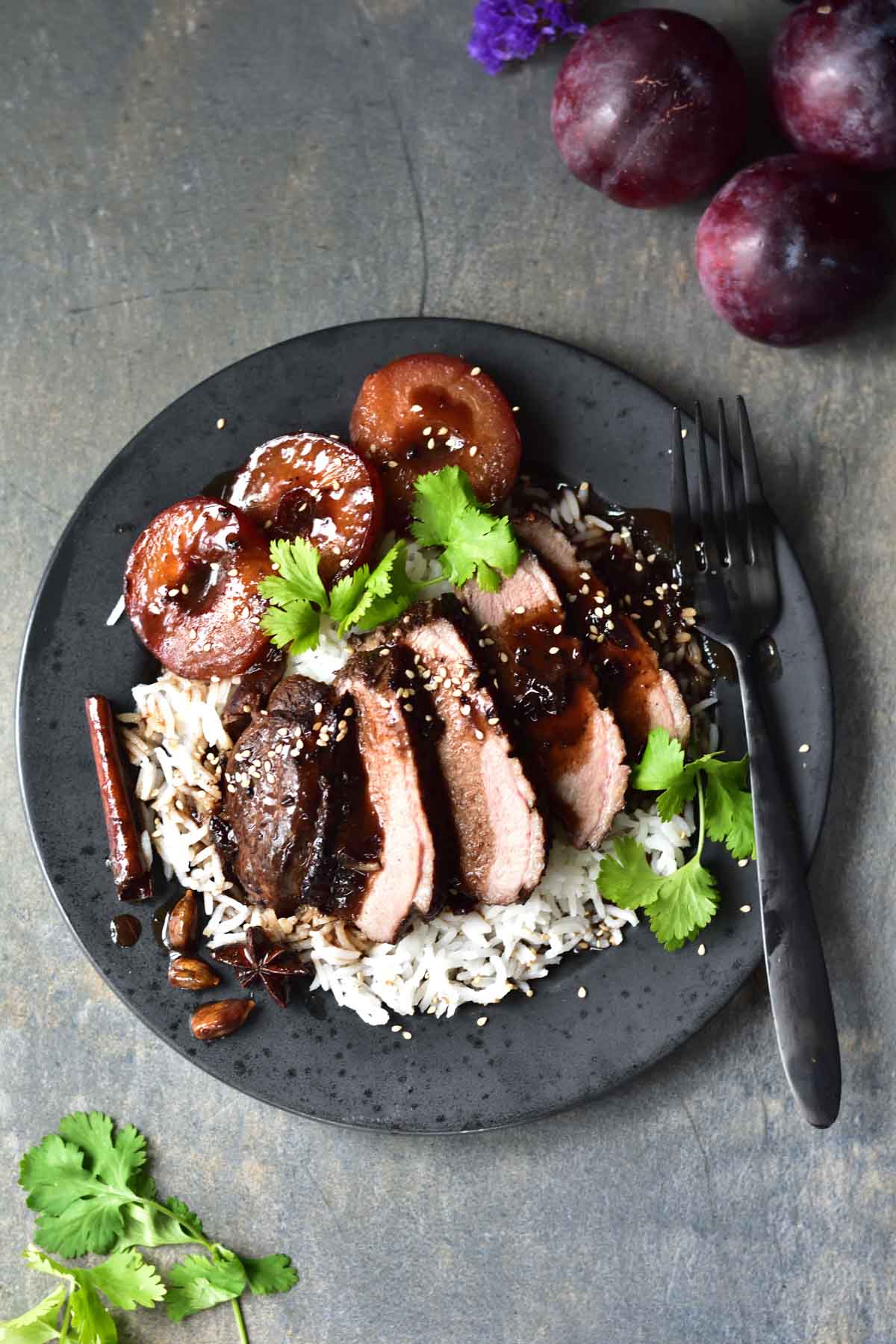 Slow-roasted duck breast with plum sauce – tender and juicy