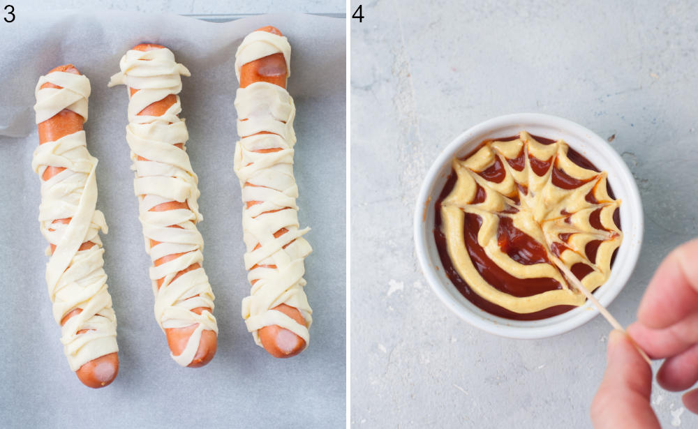 Hot dogs wrapped in pizza dough on a baking sheet. Ketchup mustard dip with a spider's web design in a white bowl.