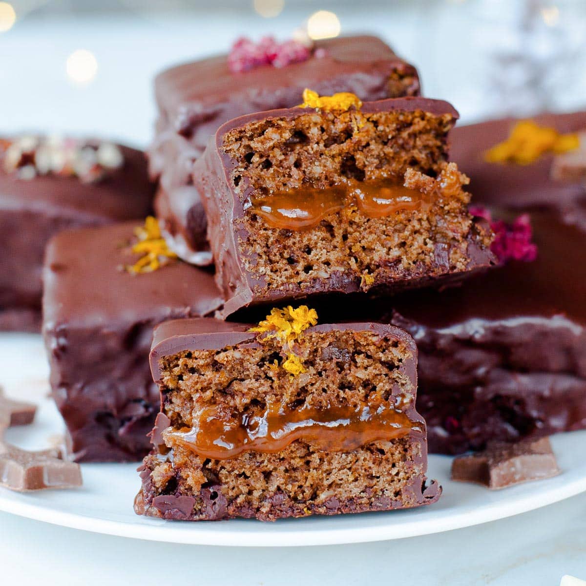 Lebkuchen squares on a white plate.