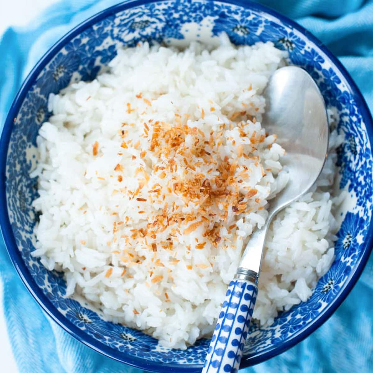 Coconut rice in a blue bowl.