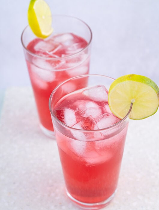 Two glasses with bay breeze drink.