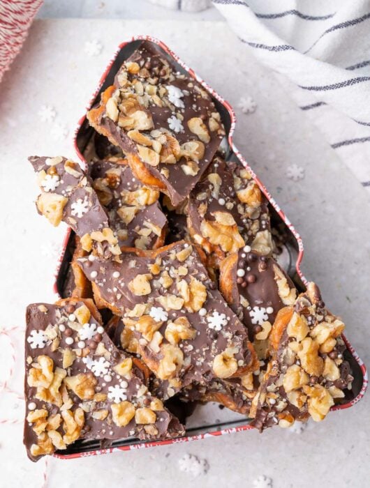 Pretzel toffee in a Christmas tree-shaped cookie tin.