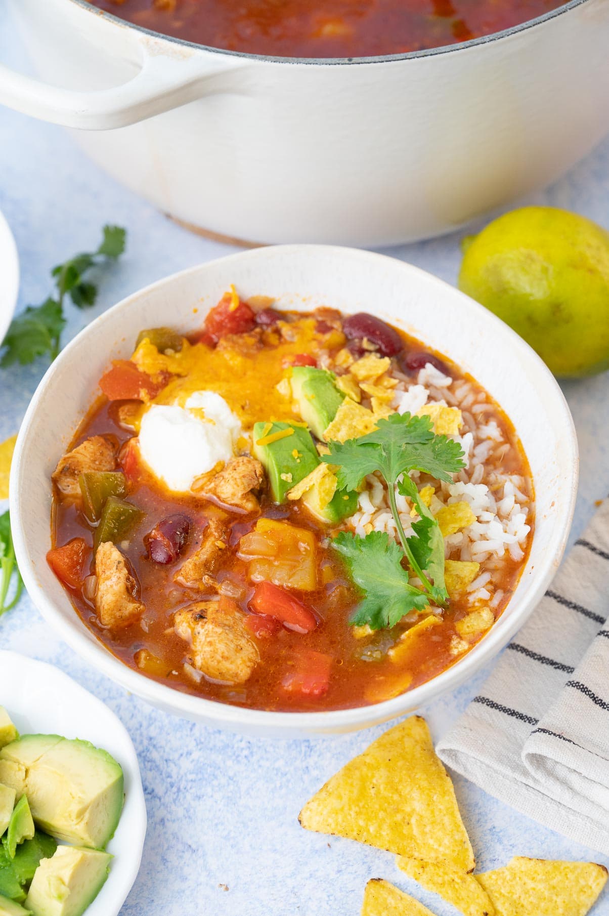 Chicken Fajita soup in a white bowl.