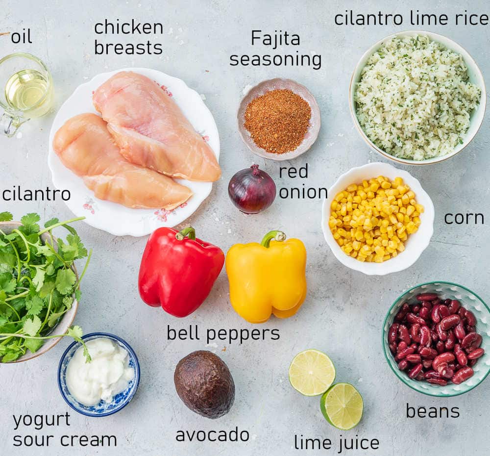 Labeled ingredients for chicken fajita bowls.