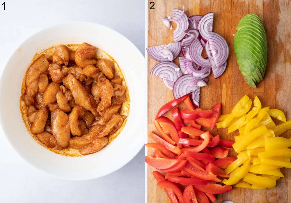 Chicken breast cut into strips with spices in a bowl. Chopped veggies for a salad on a chopping board.