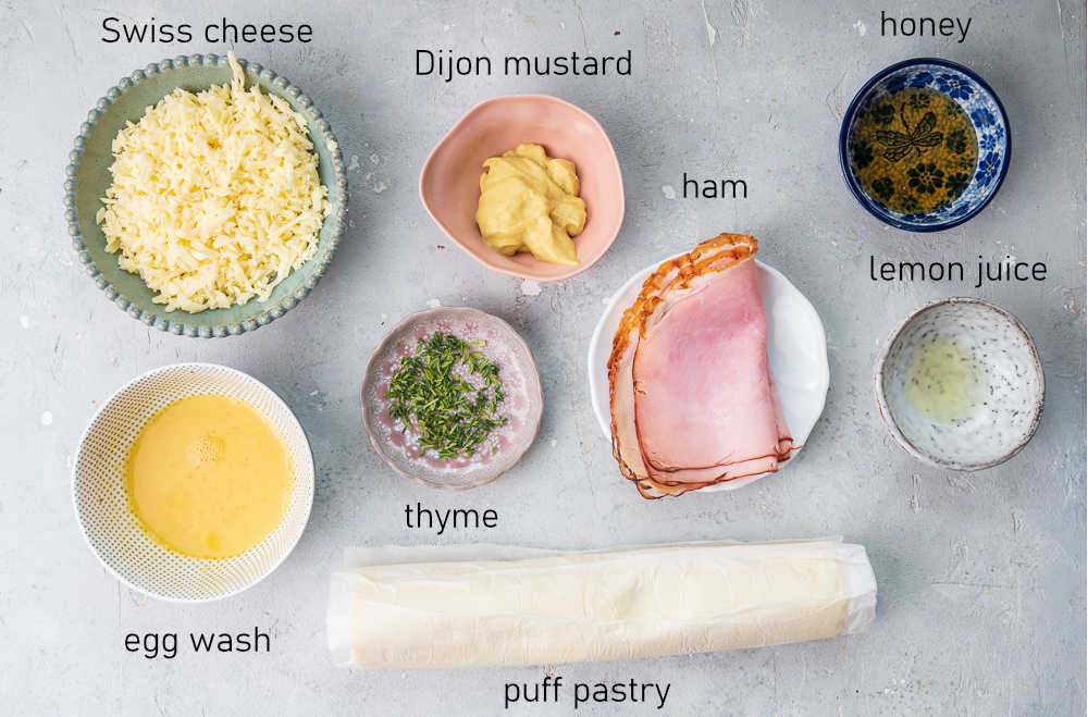 Labeled ingredients for ham and cheese puff pastry recipe.
