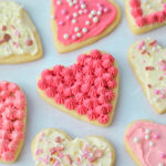Heart-shaped Valentine's day cookied with pink frosting.