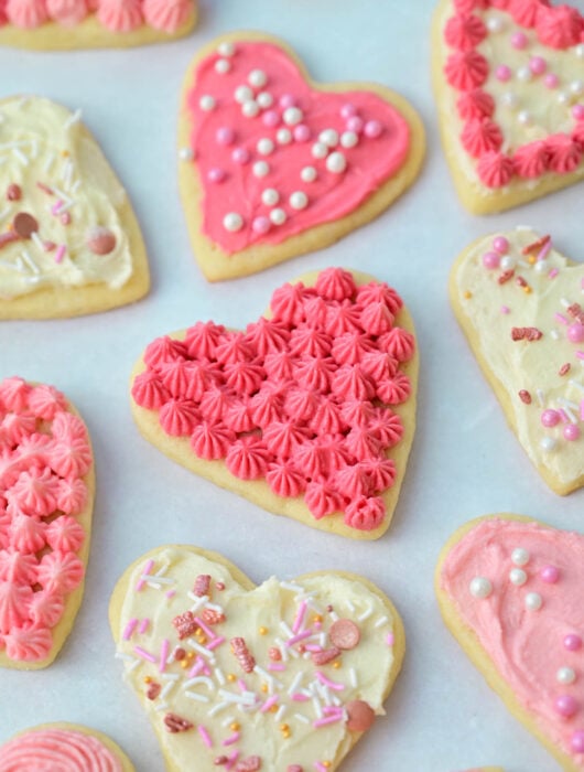 Heart-shaped Valentine's day cookied with pink frosting.