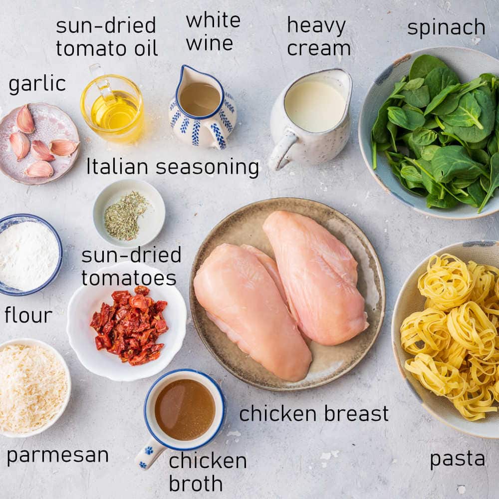 Labeled ingredients for Tuscan chicken pasta.