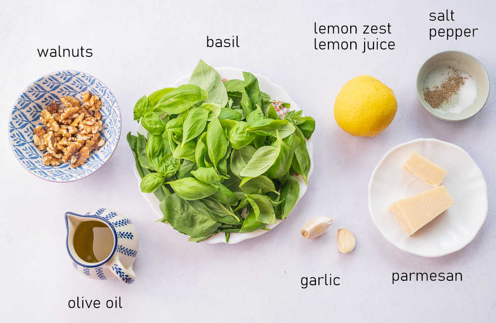 Labeled ingredients for basil walnut pesto.