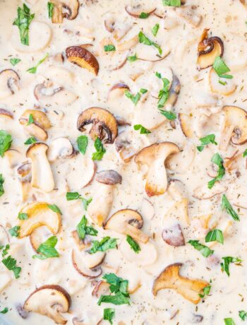 Creamy mushroom sauce in a frying pan.