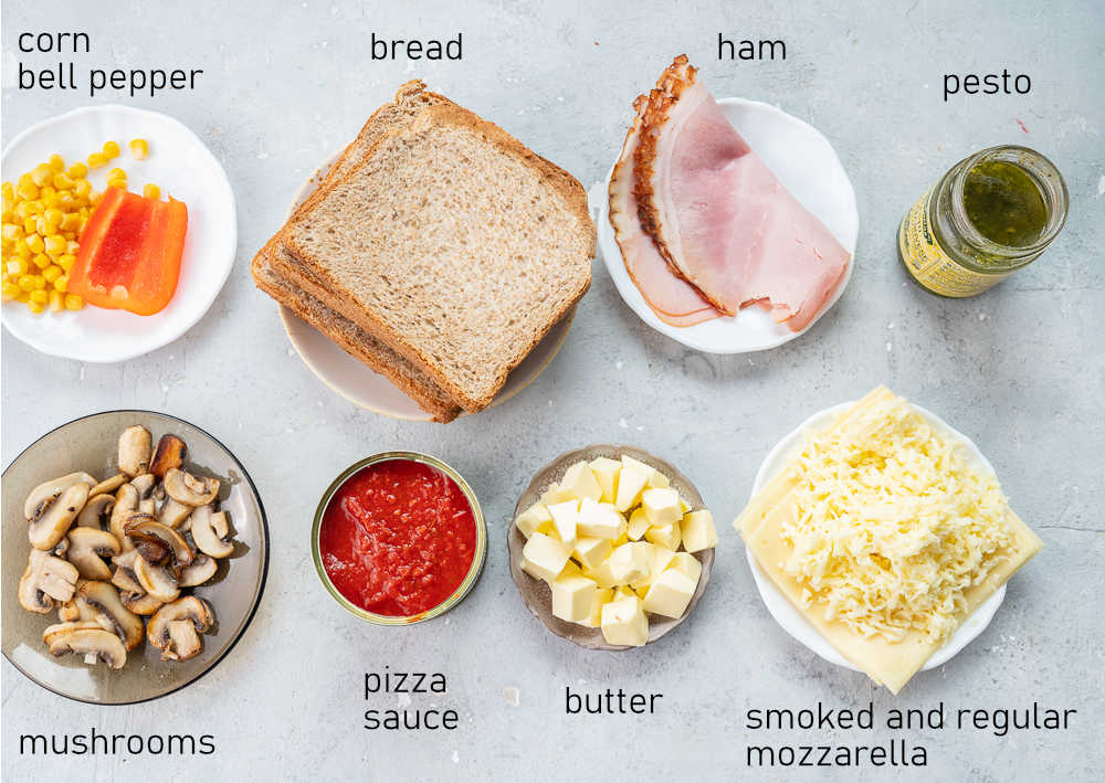 Labeled ingredients for pizza toast.