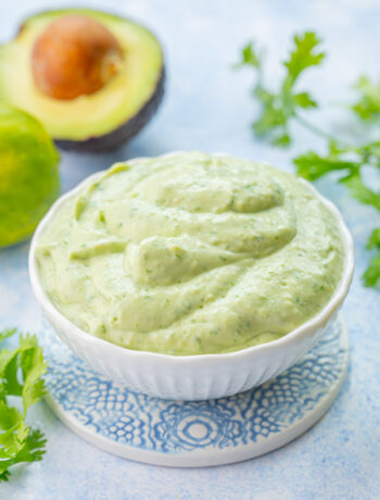 Avocado sauce in a white bowl.