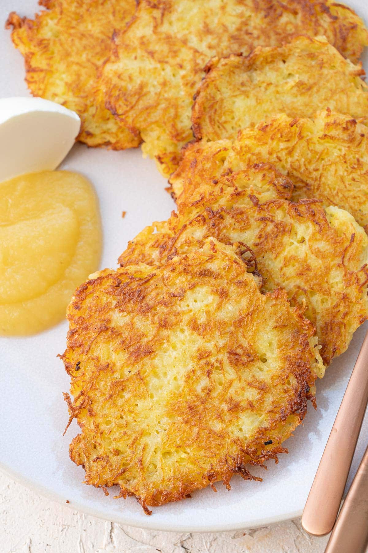 German potato pancakes on a beige plate.