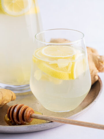Lemon ginger water in a glass.
