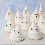 Meringue ghosts on a stone background.