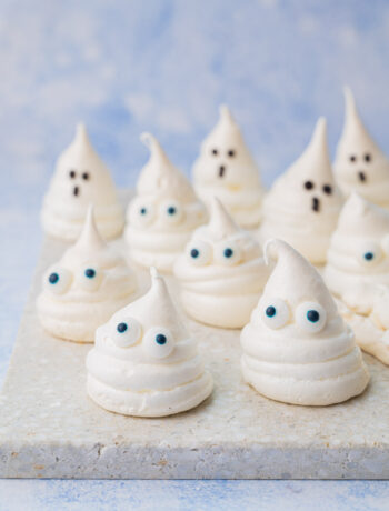 Meringue ghosts on a stone background.