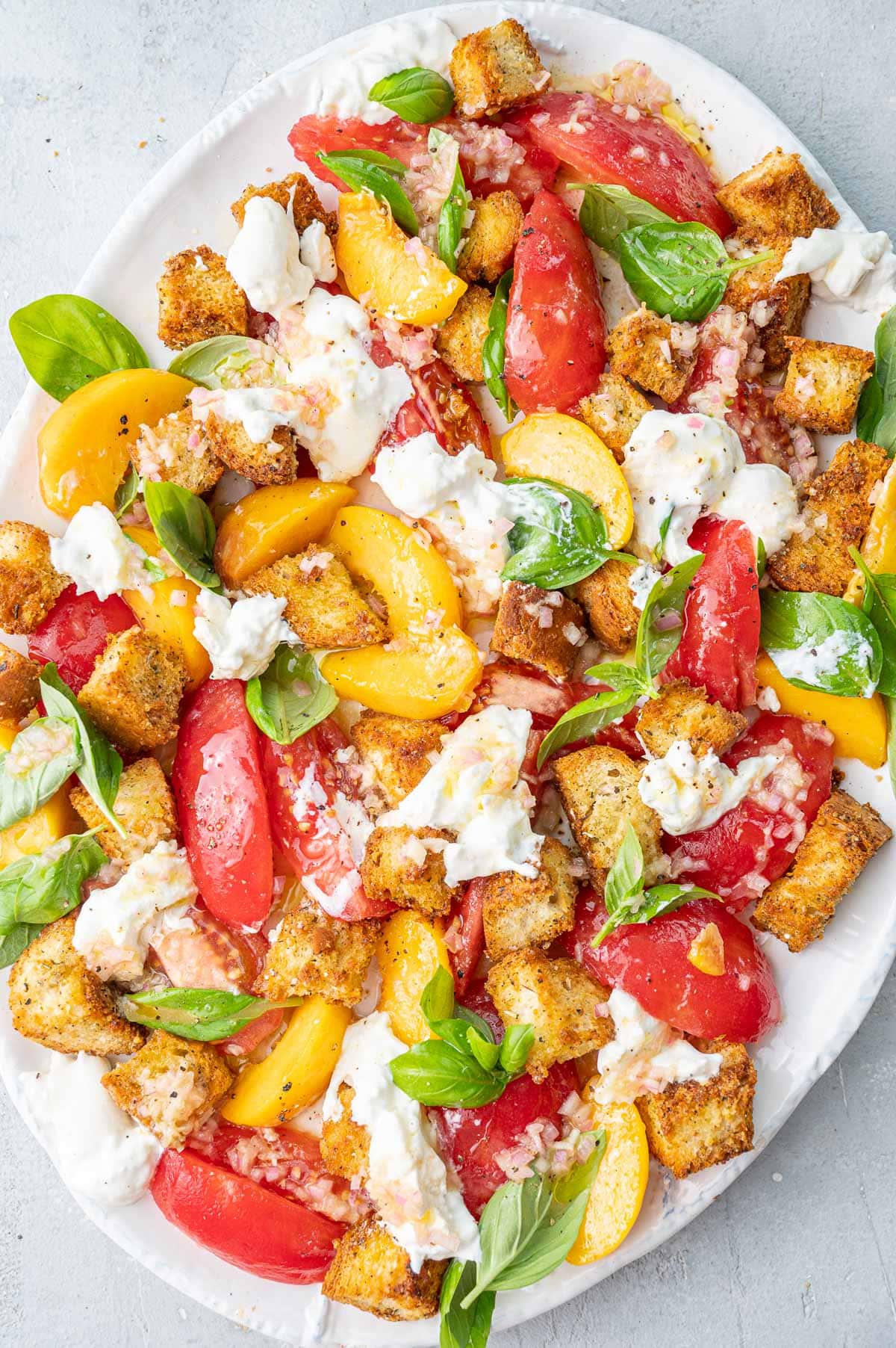 Summer Panzanella Salad on a white plate.