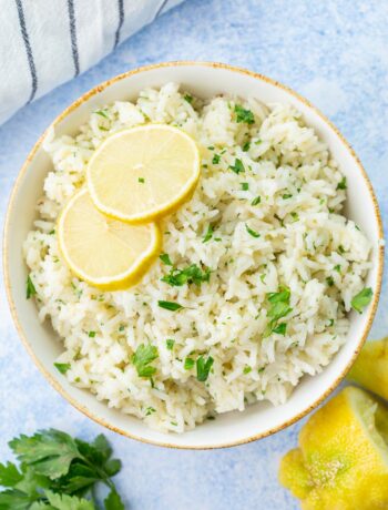 Lemon rice in a white bowl.