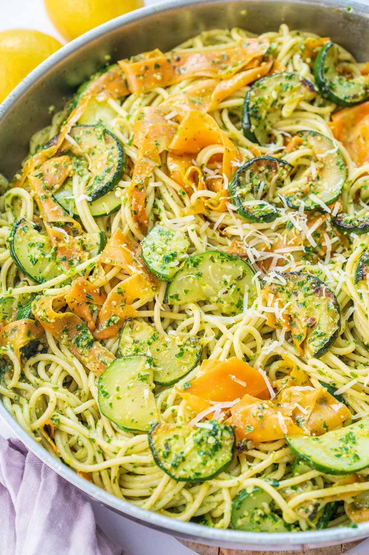 Parsley pesto pasta in a frying pan.