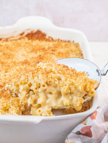 Gruyere mac and cheese in a white casserole dish.