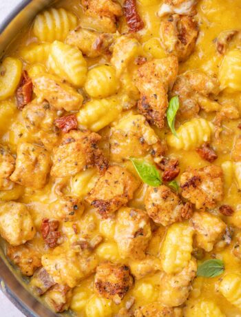 Chicken and Gnocchi in Creamy Butternut Squash Sauce in a frying pan.