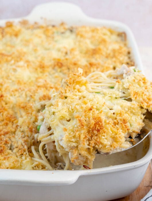 Turkey Tetrazzini in a white casserole dish.