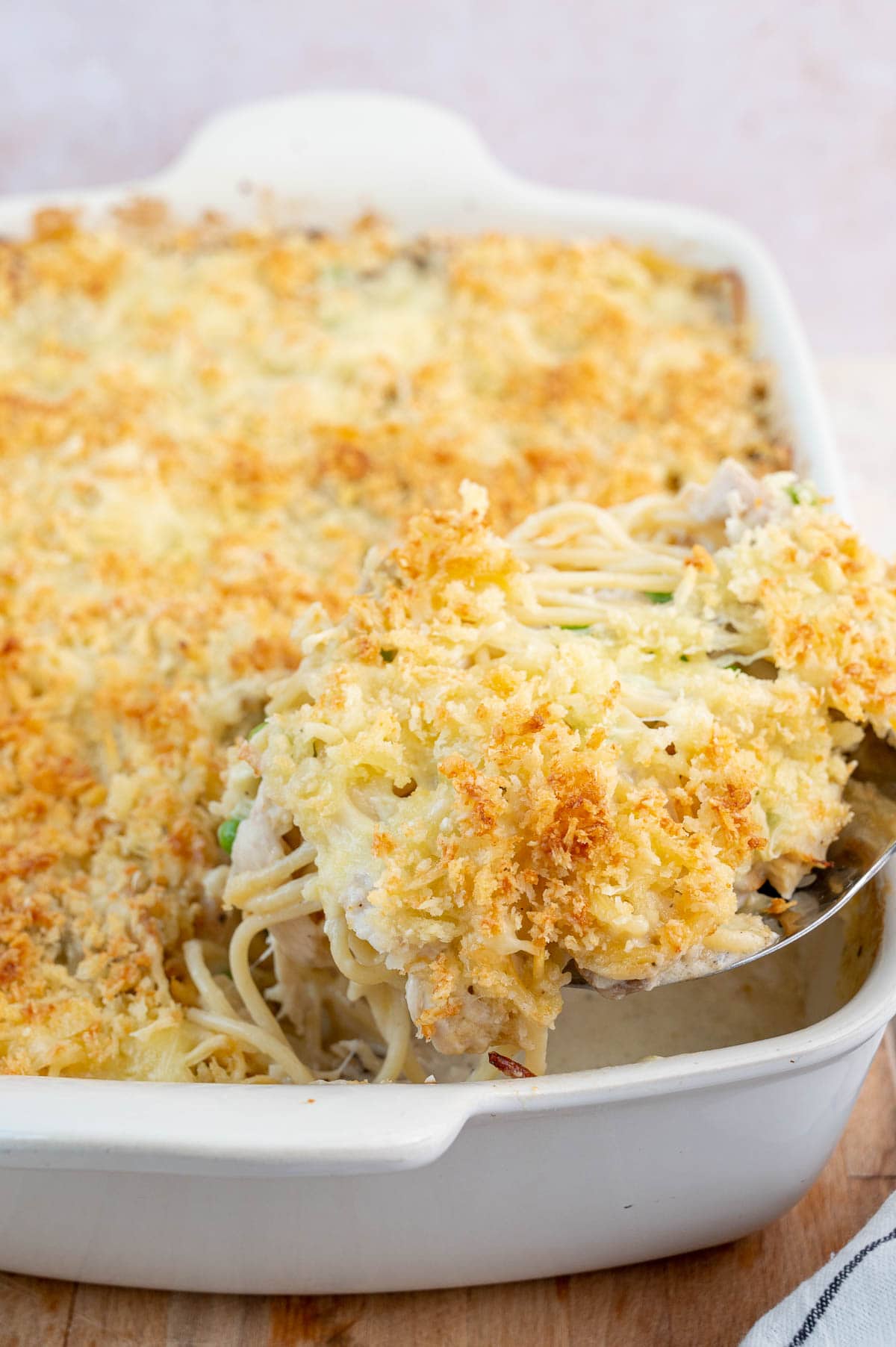 Turkey Tetrazzini in a white baking dish.