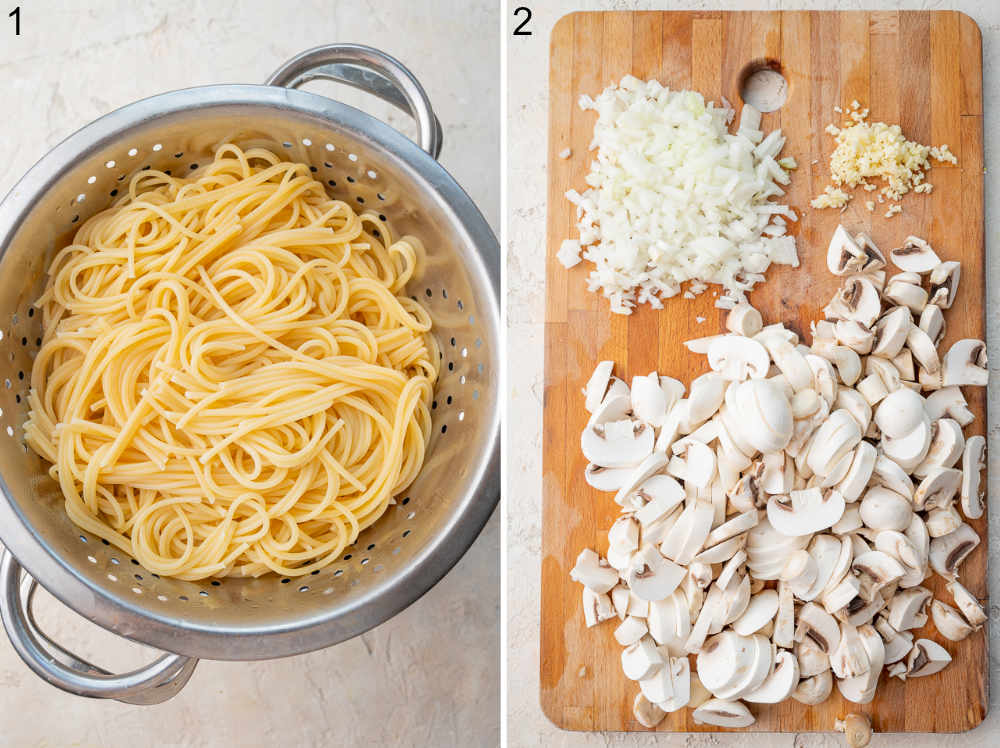 Cooked spaghetti on a colander. Chopped mushrooms, onions, and garlic on a wooden board.