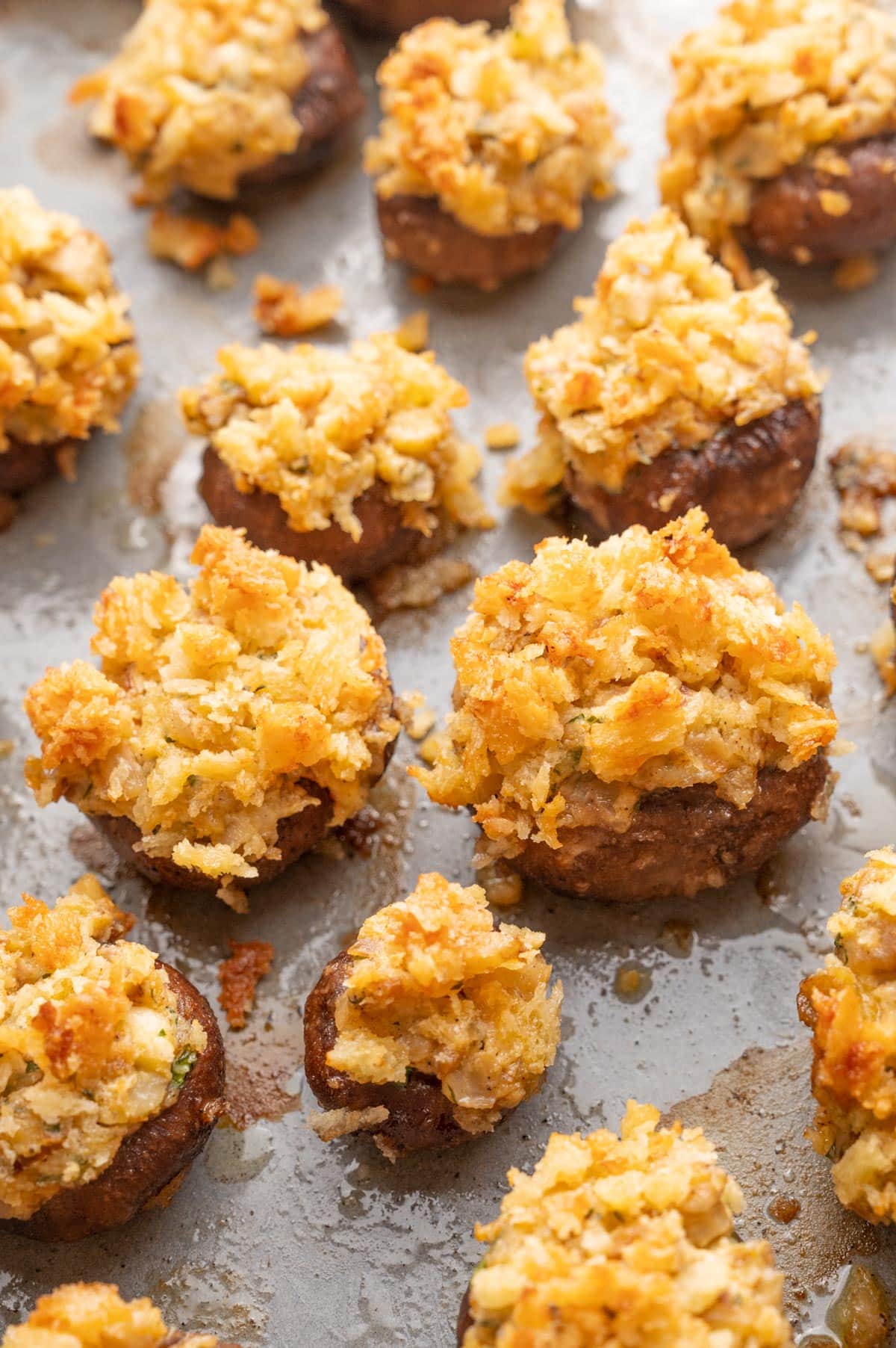 Stuffed mushrooms on a baking sheet.