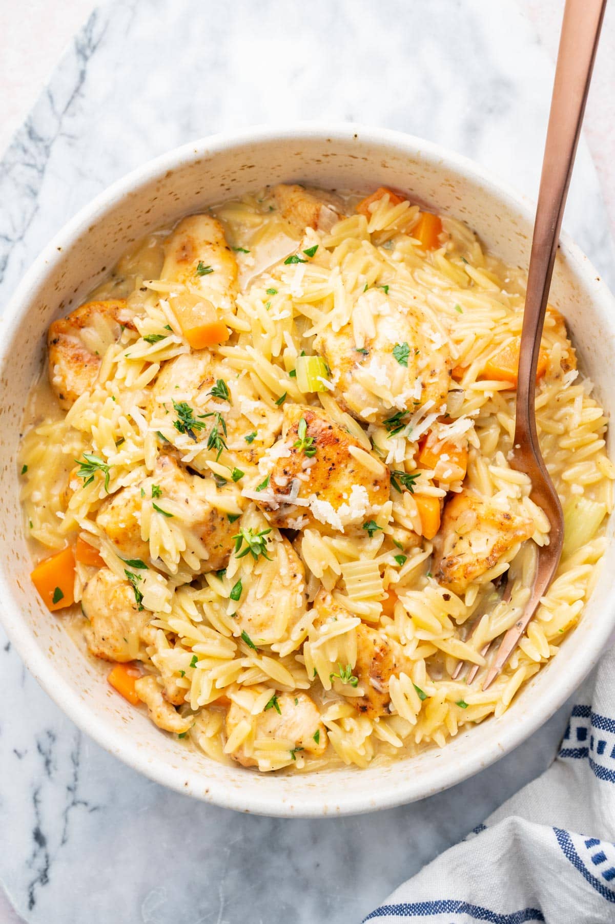 Creamy Chicken Orzo in a white bowl.