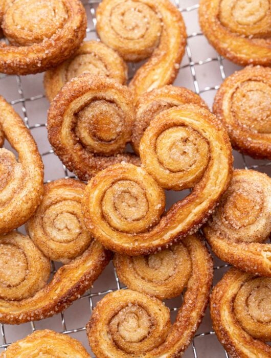 Palmiers cookies on a cooling rack.