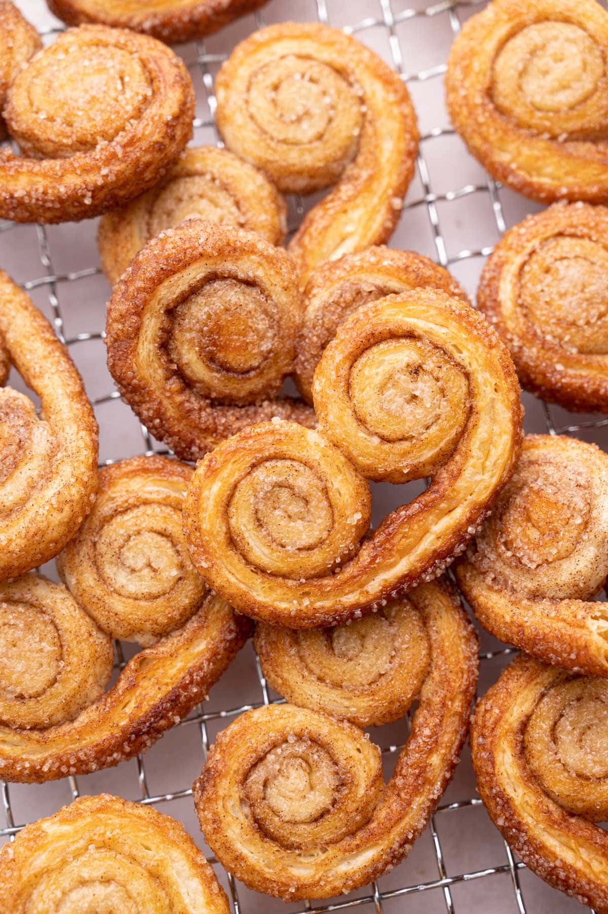 Palmiers cookies on a cooling rack.