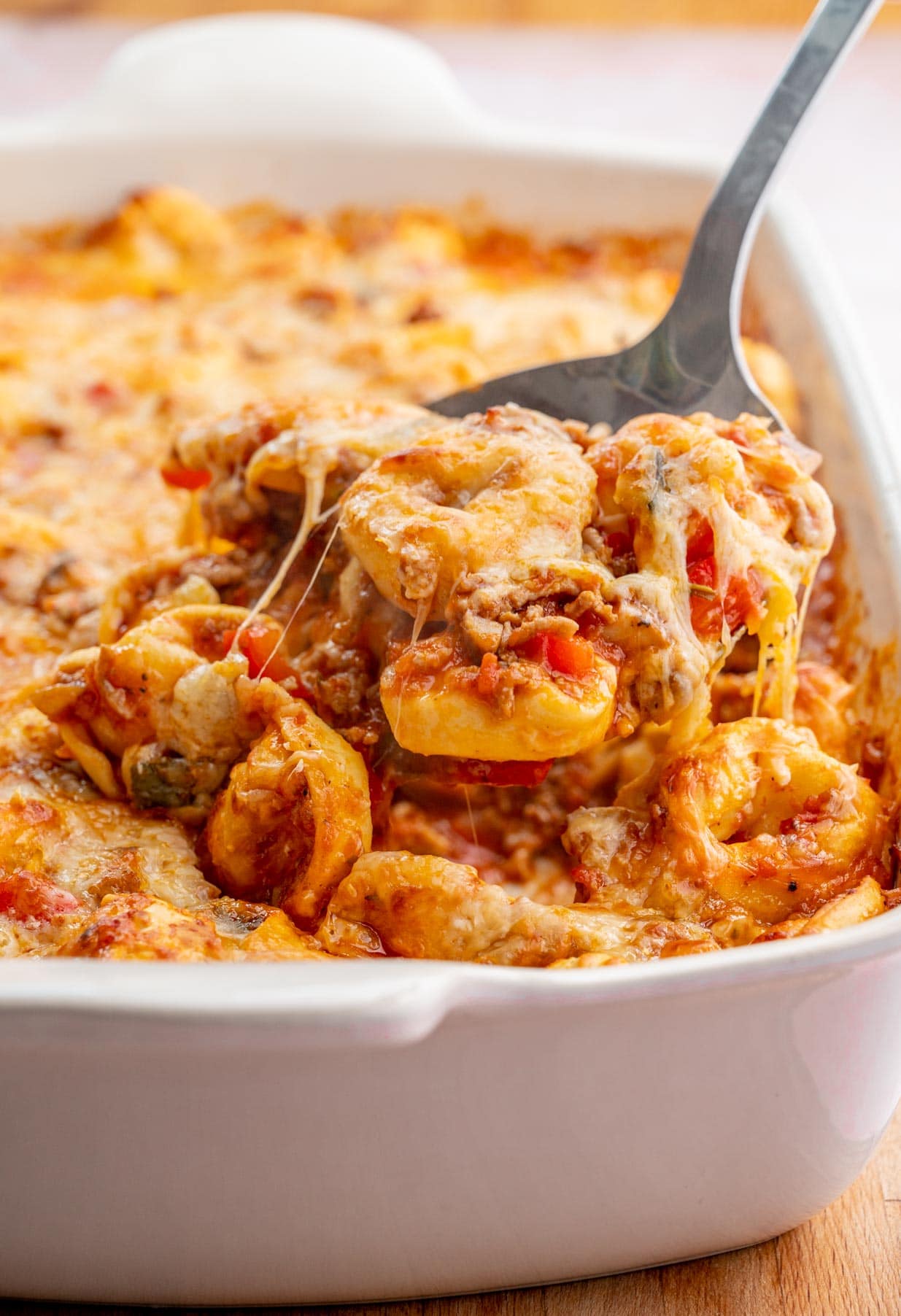 Tortellini Bake in a white casserole dish.