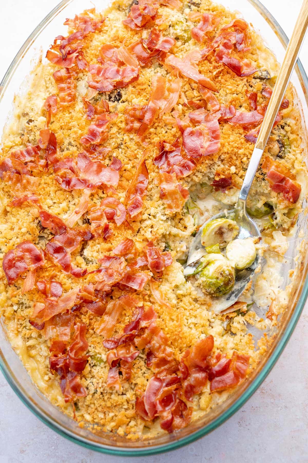 Brussels Sprouts Gratin in an oval baking dish.