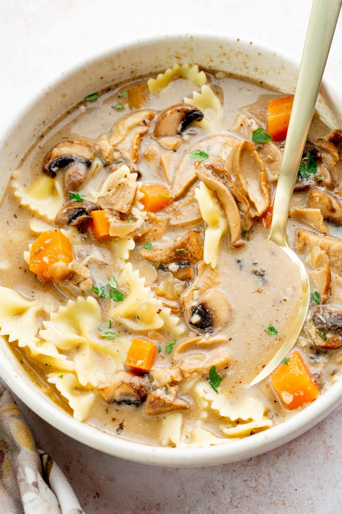 Polish Christmas Eve mushroom soup in a beige bowl.