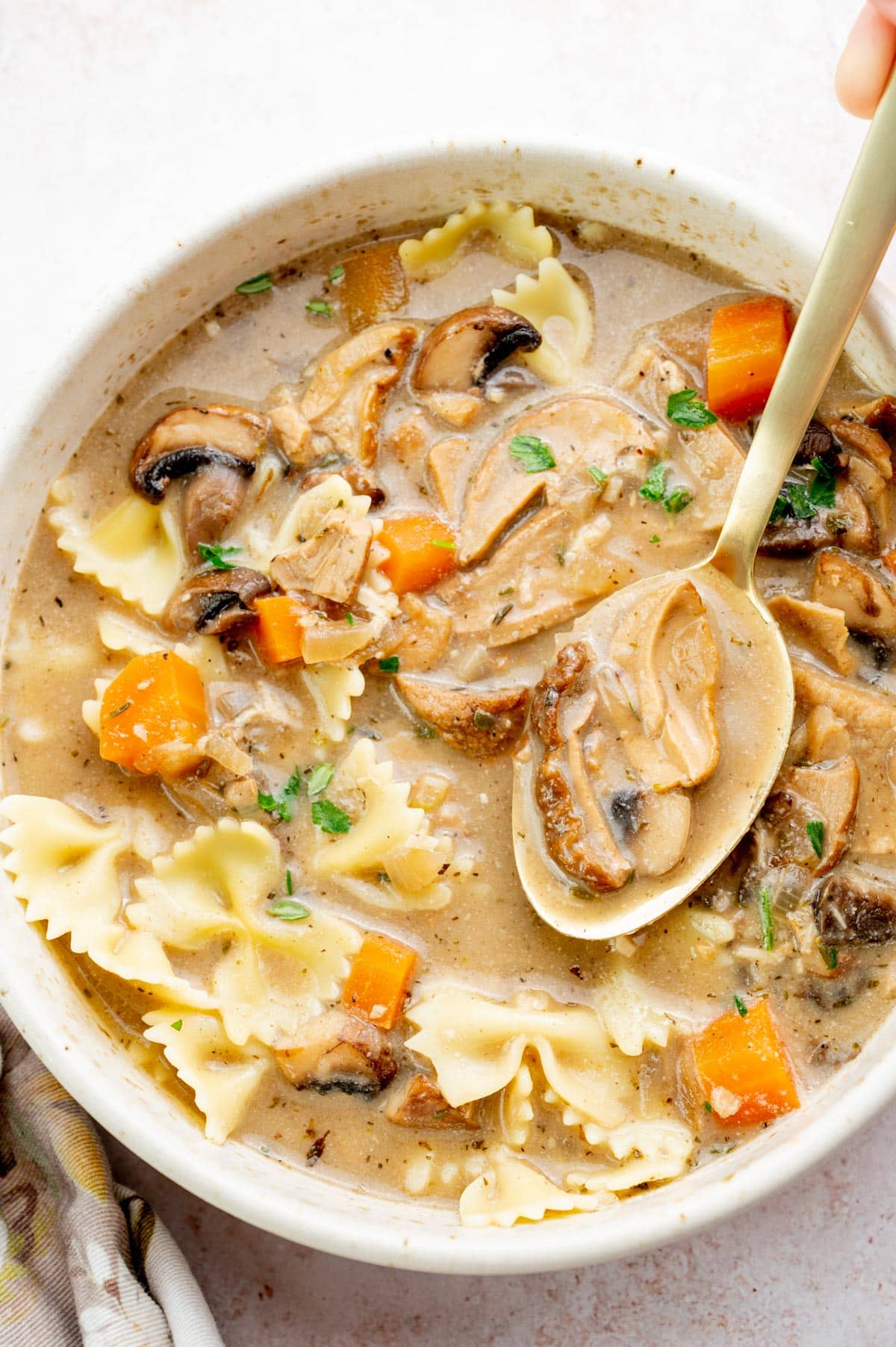 Polish Christmas Eve mushroom soup in a beige bowl.