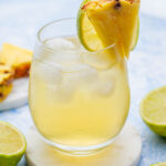 Pineapple vodka drink in a glass.