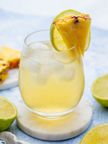 Pineapple vodka drink in a glass.