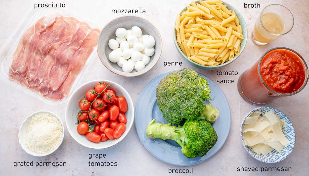 Labeled ingredients needed to prepare Cheesy Tomato Broccoli Pasta with Crispy Prosciutto.