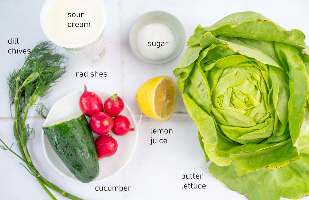 Labeled ingredients for butter lettuce salad.