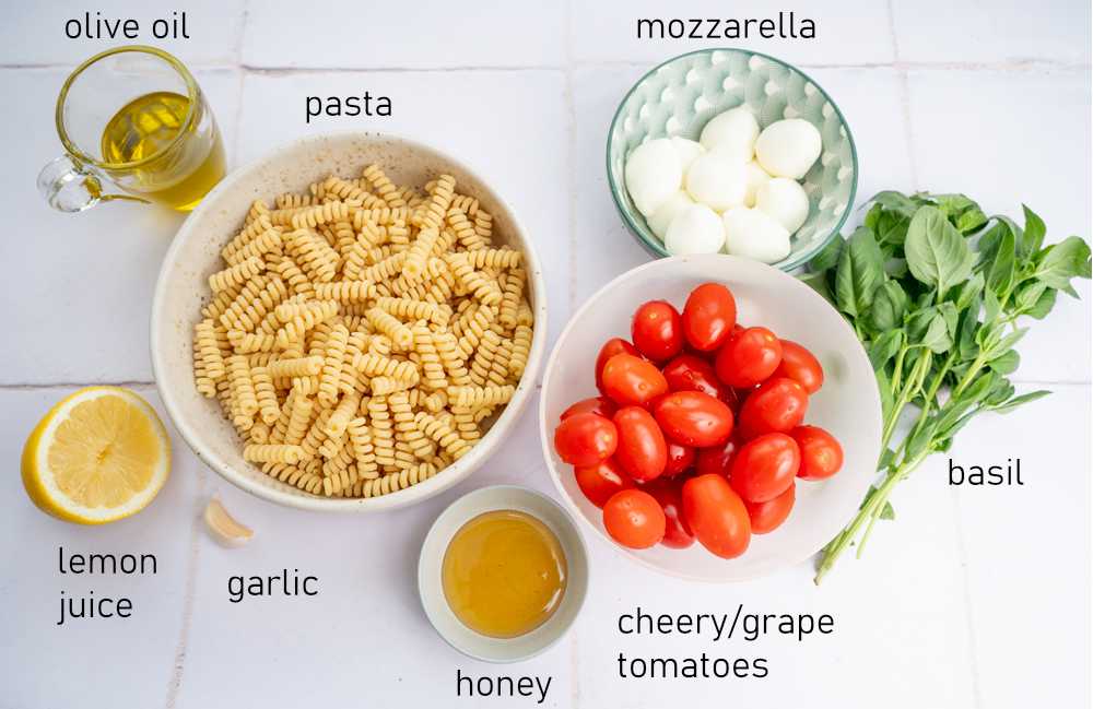 Labeled ingredients for Caprese pasta salad.