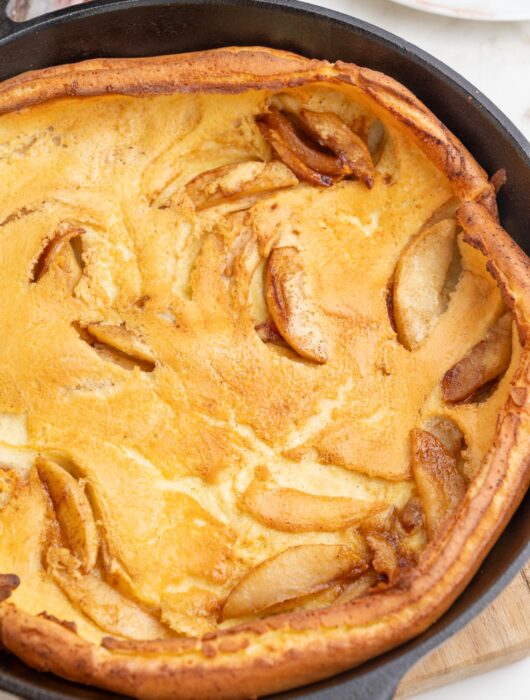 German apple pancake in a cast iron pan.