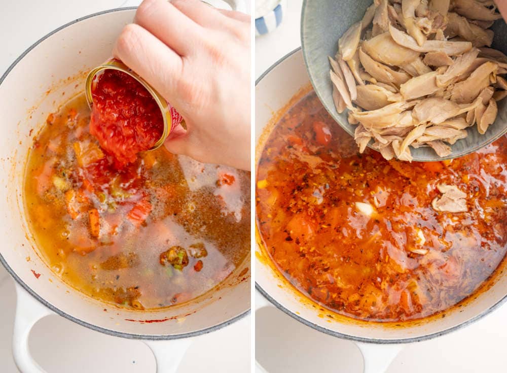 Crushed tomatoes and cooked chicken pieces are being added to a soup in a w white pot.