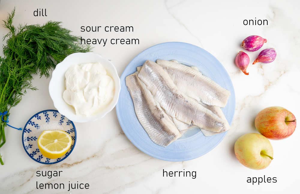 Labeled ingredients needed for Herring in Cream Sauce.